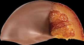 Milk chocolate covered half orange slice